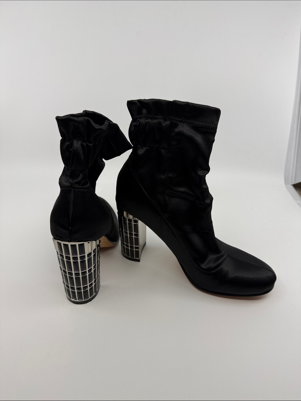 Badgley Mischka Black Sock Boot with Sculpted Silver Grid Heel